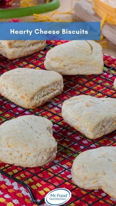 hearty cheese biscuits on a cooling rack with the words, hearty cheese biscuits