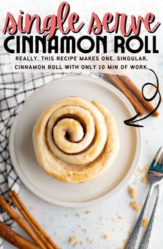 cinnamon roll on a white plate with cinnamon sticks next to it and the title reads single serve cinnamon roll