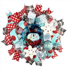 a snowman wreath with red, white and blue decorations