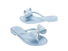 So lovely and luxe, the Slim Flip Flop brings bows to chic poolside style. Featuring a cushy footbed, metallic details and of course, ultra cute bow embellishments, slip these feminine flip flops on when you fancy some extra flair for a casual look. A little glam gets a lot of comfort. Dressy Flip Flops, Bow Embellishments, Punk Love, Poolside Style, Punk Movement, Poolside Fashion, Viktor & Rolf, Jelly Shoes, Cute Bow