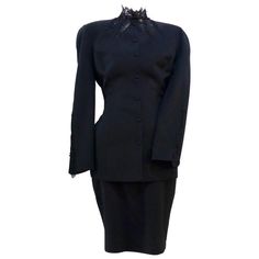 Elegant Fitted Black Set, Elegant Black Fitted Sets, Elegant Fitted Cocktail Sets, Elegant Fitted Black Skirt Suit, Elegant Black Skirt Suit For Evening, Classic Fitted Evening Sets, Elegant Black Skirt Suit For Formal Occasions, Elegant Black Skirt Suit For Party, Elegant Black Long Sleeve Skirt Suit