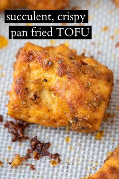 a close up of food on a pan with the words succulent crispy pan fried tofu