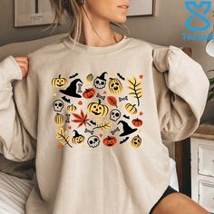 "This Cute Halloween Theme graphic hoodie/sweatshirt is the most thoughtful way to show your appreciation for your family and friends during fall/halloween/pumpkin season. How To Order 1. Kindly check and review all photos for your reference. 2. Choose your Hoodie/Sweatshirt size. 3. Choose your Hoodie/Sweatshirt color 4. Click add to cart when done. 5. If you need more than 1 item, please go back and add more. 6. Click \"Proceed to check out\". 7. If you have any questions please contact us. 8. Cute Halloween Party, Halloween Shirts For Women, Trick Or Treat Costume, Hallowen Ideas, Witch Sweatshirt, Pumpkin Sweatshirts, Halloween Hoodie, Costume Shirts, Halloween Vintage