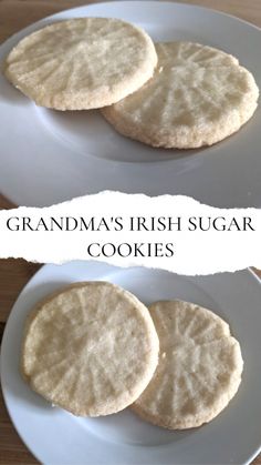 two white plates topped with sugar cookies on top of a wooden table next to each other