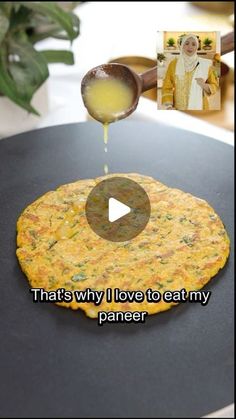 an omelet is being drizzled with sauce on it and the words, that's why i love to eat my paneer