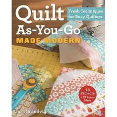 the book cover for quilt as you go made modern, with scissors and fabric on it