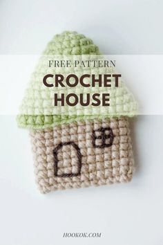 a crocheted house with the words free pattern on it