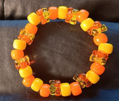 Hand made Regular/Tight fitting Beaded Halloween, Halloween Bracelet, Yellow Bracelet, Halloween Beads, Orange And Yellow, Light Orange, Jewelry Bracelets, Hand Made, Beaded Bracelets