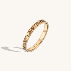 The Sun Band Ring has an outstanding design with the sun engraved which will give you a heartwarming appearance with accentuating the lightening of the Sun. - Made in 14k solid gold- Band Width: 2.41 mm / 0.09 inches- Thickness: 1.31 mm / 0.05 inches - This product comes with iconic Norm Jewels gift box Sun Jewelry, Sun Ring, Modest Outfit, Luxury Jewelry Brands, Solid Gold Band, Jewelry Accessories Ideas, Gold Band Ring, Jewelry Lookbook, Solid Gold Rings