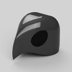 an image of a black helmet on a white background that looks like it is made out of plastic