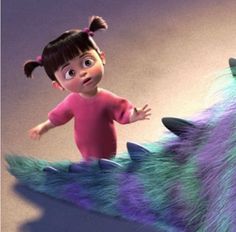 a cartoon character riding on top of a purple and green monster like creature with long black hair