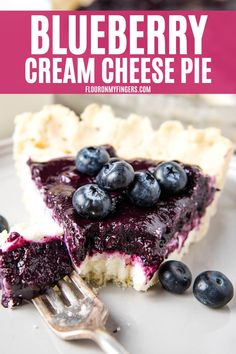 a slice of blueberry cream cheese pie on a plate with a fork next to it