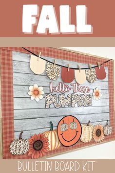 a bulletin board with pumpkins and fall decorations