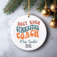 a personalized christmas ornament with the words best ever gymnastics coach on it