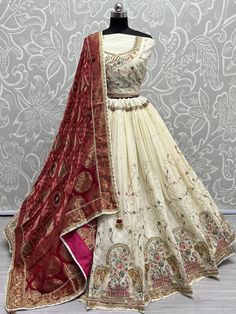 Introducing the glamorous off-white thread work georgette designer lehenga choli! This exquisite ensemble is crafted from high-quality georgette material in a stunning off-white color. With its intricate embroidered work, fancy dori work, multi-thread work, sequin work, zircon diamond work, and zari work, this lehenga exudes elegance and sophistication.
The set includes a similar color georgette material choli that is adorned with fancy embroidered work, dori work, multi-thread work, and diamond Sabyasachi Lehenga Bridal, Lehenga Choli Latest, Sabyasachi Bridal, Dori Work, Georgette Material, Indian Wedding Lehenga, Bridesmaid Lehenga, Desi Outfits, Sabyasachi Lehenga