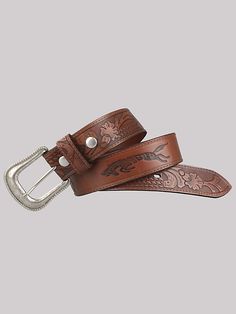 PRACTICAL & UNDENIABLY WESTERN There's no better way to tie your look together than with a premium leather tooled belt. This tooled leather belt is made to be worn every day. It's made from full-grain, vegetable-tanned leather and zinc-alloy hardware, with a big buckle to help you dress up your favorite pair of Wrangler jeans. Plus, a specially designed strap honors the legacy we've been building since 1947. Tooled Belt, Leather Tool Belt, Cult Leader, Tooled Leather Belts, Wrangler Accessories, Style Bundle, Gay Fashion, Tool Belt, Leather Belts Men