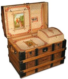 an antique trunk with paintings on it