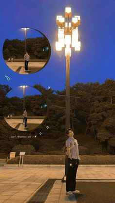 a woman standing under a street light next to a park with trees in the background