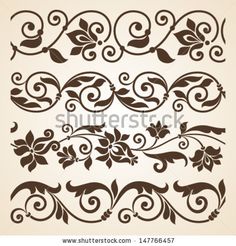 an ornate set of design elements with swirls and leaves in brown on a beige background