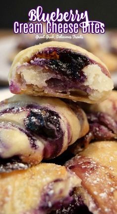 blueberry cream cheese bites stacked on top of each other