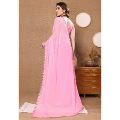 Light Pink colored saree is prettified with beautiful embroidered butti work as shown which makes it appear classy. This saree is made of georgette fabric which is accompanied with banglori silk blouse piece which you can customise as per your design/style. Women can buy this saree to wear for their party and functions. Note:- The actual product may differ slightly in color and design from the one illustrated in the images when compared with computer or mobile screen Measurements: Saree : George Traditional Drape Saree With Mirror Work, Chiffon Dupatta With Unstitched Blouse For Navratri, Navratri Chiffon Dupatta With Unstitched Blouse, Diwali Fitted Chiffon Blouse Piece, Fitted Chiffon Blouse Piece For Diwali, Georgette Pre-draped Saree With Dupatta For Diwali, Traditional Chiffon Pre-draped Saree For Eid, Navratri Chiffon Blouse Piece With Dupatta, Navratri Chiffon Blouse With Dupatta