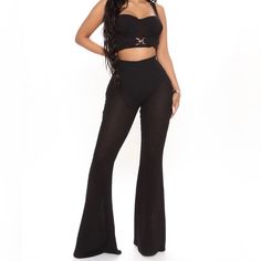 Black Sleeveless Cropped With Gold Buckle, Flared See Through Pants With Panty Liners. Great Stretch. Polyester , Rayon, Spandex. Final Sale! Wide Leg Two-piece Party Bottoms, Party Wide Leg Two-piece Bottoms, Party Two-piece Wide Leg Bottoms, Stretch Wide-leg Two-piece Bottoms, Two-piece Wide Leg Pants For Night Out, Solid Color Stretch Two-piece Bottoms, High Waist Two-piece Party Pants, Chic Two-piece Bottoms For Night Out, Chic Black High Waist Sets