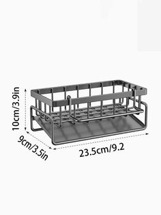 a metal tray with two compartments and measurements for the bottom section, side by side