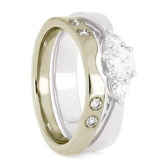 two white gold wedding rings with diamonds