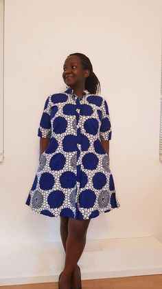 You will stand out in our Cornflower dress! Our loose fit colourful dresses made out of non-stretchy African print are perfect for you in case you are looking for a style idea that is versatile, comfortable, and looks fabulous year-round. All materials used to design the dresses are sourced in Kenya.  MEASUREMENT GUIDE:  We recommend asking questions about sizes or you can take your own measurements (at the bust) if unsafe. Since its an A- Line, you only need to ensure that you have the right fi Loose Ankara Dresses, Patterned Printed Dresses With Relaxed Fit, Relaxed Fit Printed Patterned Dresses, Relaxed Fit Patterned Printed Dresses, Cotton Floral Print Short Sleeve Shirt Dress, Cotton Short Sleeve Shirt Dress With Floral Print, Cotton Floral Print Shirt Dress With Short Sleeves, Patterned Printed Short Sleeve Dress, Cotton Half Sleeve Dress With Pockets