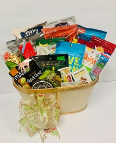 a basket filled with lots of different types of snacks