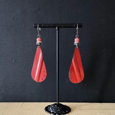 I repurposed these earrings from a rustic vintage tin. The color is a Chinese red rather than orange or a true red. They are lightweight and measure 2 3/8" from the base of the ear wires. All imperfections are a design element and intentional. True Red, Vintage Tin, Design Element, Tin, Selling On Etsy, Etsy App, Sell On Etsy, Jewelry Earrings Dangle, Dangle Drop Earrings