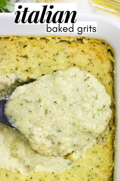 a spoon scooping some food out of a casserole dish with the words italian baked grits above it