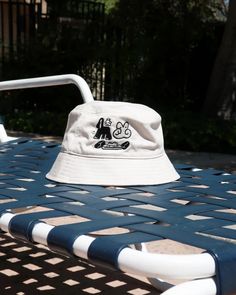 Brand new cotton bucket hat in Ivory designed by Saigo no Shudan. On the front at an angle, you'll find a jolly foursome, while the back at an angle features the embroidered team title 最後の手段, read as Saigo no Shudan, which translates to "Last Resort".Dimensions: (φ) 23" / 59cmMaterial: Cotton 100%One size fits mostMade in LA Outdoor Cream Cotton Bucket Hat, White Cotton Bucket Hat One Size, Cream Cotton Bucket Hat, Cream Cotton Bucket Hat, One Size, Cream Cotton Bucket Hat, One Size Fits Most, White Cotton Bucket Hat With Curved Brim, White Casual Sun Hat, White Flat Brim Bucket Hat For Streetwear, Casual White 5-panel Sun Hat