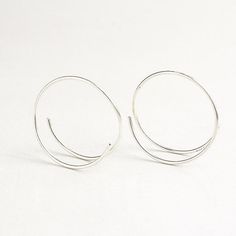 Small silver hoops, unique hoops, small circle earrings Crescent Earrings, Small Circle, Silver Lights, Hazel Eyes, Everyday Earrings, Circle Earrings, Jewelry Earrings Hoops, Silver Hoops, Silver Wire