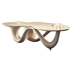 a wooden table with an unusual design on it