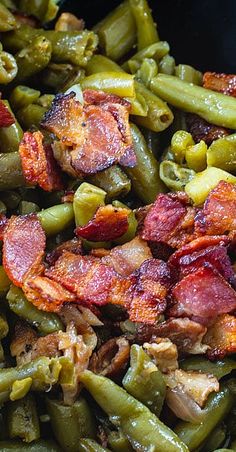 green beans and bacon are mixed together in a skillet