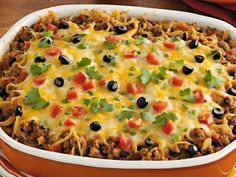 an enchilada casserole with meat, cheese and black olives