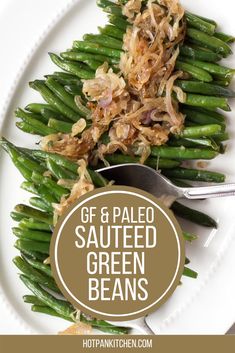 green beans with sauteed onions on a white plate and text overlay that reads gf & paleo sauteed green beans