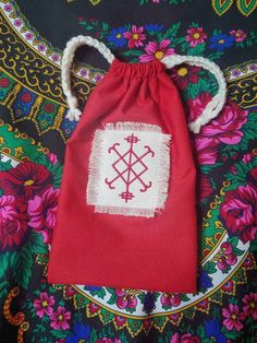 a red bag sitting on top of a table