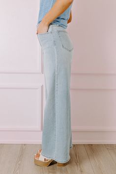 - Make space in your closet for these trendy jeans! - Unlined denim material with subtle fading - A high waistline with belt loops, a hidden zip fly, and button closure - A functional five pocket cut - A wide legged silhouette that ends in straight hemlines Measurements 1 : Front Rise 12.5", Hip 31", Inseam 32", Length 42", Waist 25". 3 : Front Rise 12.5", Hip 32", Inseam 32", Length 42", Waist 26". 5 : Front Rise 13", Hip 33", Inseam 32", Length 42", Waist 27". 7 : Front Rise 13", Hip 34", Inse High Waist Wide Leg Jeans, Trendy Jeans, Ribbed Bodysuit, Denim Material, Light Wash Denim, Leg Jeans, High Waist, Wide Leg, High Waisted