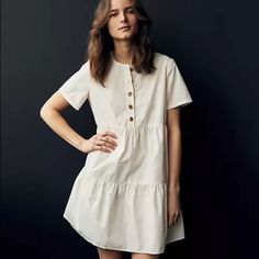 Off-White Colored Button-Front Short-Sleeve Tiered Mini Dress, Never Worn Https://Www.Madewell.Com/Button-Front-Short-Sleeve-Tiered-Mini-Dress-Ao277.Html White Dress With Button Cuffs For Day Out, White Dresses With Button Cuffs For Day Out, Knee-length White Shirt Dress With Button Cuffs, White Cotton Dresses With Button Cuffs, White Mini Dress With Button Closure And Short Sleeves, White Casual Dress With Button Cuffs, Casual White Dresses With Button Cuffs, Casual White Dress With Button Cuffs, White Mini Length Shirt Dress With Buttons