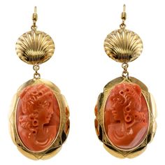 This gorgeous pair of earrings is finely crafted in solid 18K Yellow gold, they also have Italian marks. The genuine Coral high profile cameos measure 22mm x 15mm. They are highly detailed and very well made. The bottom dangling part of each earring measures 1-1/8 inches long including a gold frame. The upper part is 9/16 inches long. The entire earring's length is almost 2 inches long including gold hook. The earrings are in excellent condition and they weigh 14.4 grams. Cameo Earrings, Vintage Fine Jewelry, 18k Gold Earrings, Cameo Jewelry, Retro Earring, Coral Earrings, Chunky Jewelry, Gold Diamond Earrings, Antique Necklace