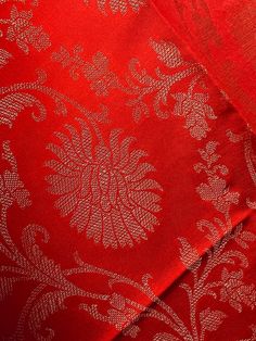 Beautiful Red Color Floral dupatta with muted gold Zari Weaving Work with red tassels. Dupatta has floral Jaal all over. Item: DupattaBase color : Red with Muted Gold Fabric : Soft Silk (Not Pure Silk)Work : Zari Weaved with tasselsLength of the Dupatta : 92 inches approx.Width of the dupatta : 35 1/2 inches (Approx.)Store Policies- No return or exchange will be accepted for color variations. Colors can vary in room light, sunlight and due to screen resolution and other reasons. - No return or e Red Jamawar Churidar With Zari Work, Elegant Red Jamawar Unstitched Suit, Red Jamawar Unstitched Suit For Festive Occasions, Festive Red Jamawar Unstitched Suit, Red Zari Weaving Blouse Piece For Eid, Red Jamawar Unstitched Suit For Festivals, Red Jamawar Churidar With Traditional Drape, Festive Gold Katan Silk Churidar, Traditional Red Jamawar Churidar