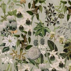 a painting of flowers and leaves on a gray background