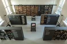 an overhead view of a room with many books on shelves