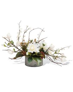 a vase with white flowers and greenery in it on a white background for decoration