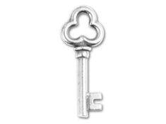 a silver key with a heart on it