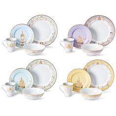 a set of dinnerware with castle designs on the front and side dishes in different colors