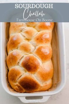 a loaf of sourdough bread in a white casserole dish with text overlay