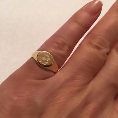 "Pinky ring, Engraved ring, Initial Ring, Personalized Ring Engraved Signet ring with Round Seal- Best quality 18k Gold Plate Engraved 1 letter - Vintage style Diameter: 0.7 mm = 0.27\" Please note in the \"notes to seller\" at checkout. : * state your ring size * letter you want to apper The product will arrive to you packed in gift box and padded envelope to maintain the product Our jewelry are water resistant and comes with 1 year warranty Thank you for your interest. Please check out our oth 14k Gold Jewelry With Initials On Round Band, Oval Promise Jewelry Tarnish Resistant, Oval Promise Jewelry With Tarnish Resistance, Tarnish Resistant Initial Ring For Anniversary, Dainty Yellow Gold Signet Ring For Promise, Symbolic 14k Gold Initials Jewelry, Symbolic 14k Gold Jewelry With Initials, Fine Jewelry Signet Ring As Promise Ring, Fine Jewelry Promise Signet Ring